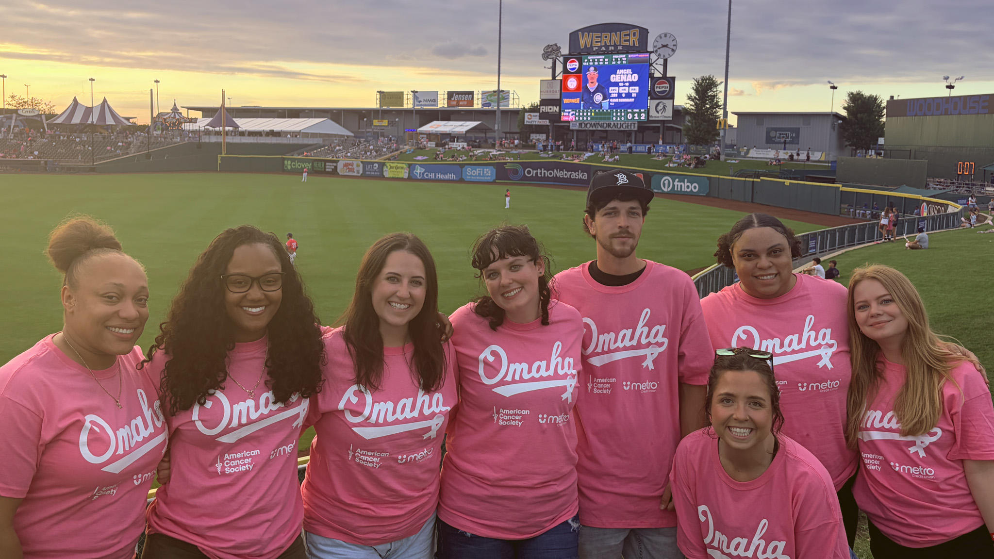 Metro Credit Union employees enjoying a night at the ballpark for a good cause.